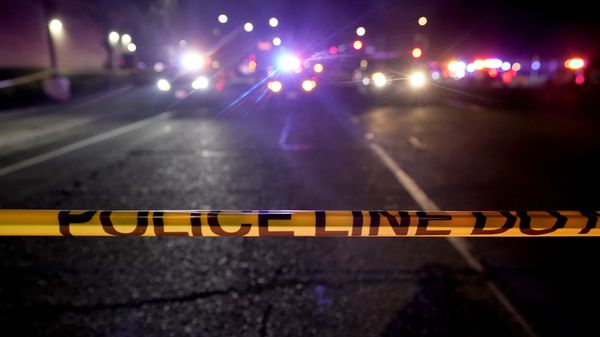 A police tape blocks a road near the scene where a Sacramento County Sheriff's deputy was shot and a suspect was shot and killed in the Sacramento suburb of Carmichael, Calif., Friday, Jan. 15, 2021. - Sputnik International