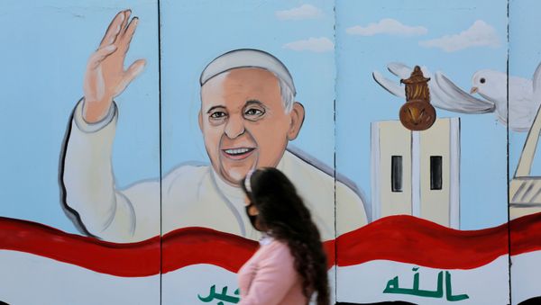 A mural of Pope Franci is seen on the wall of a church upon his upcoming visit to Iraq, in Baghdad. - Sputnik International