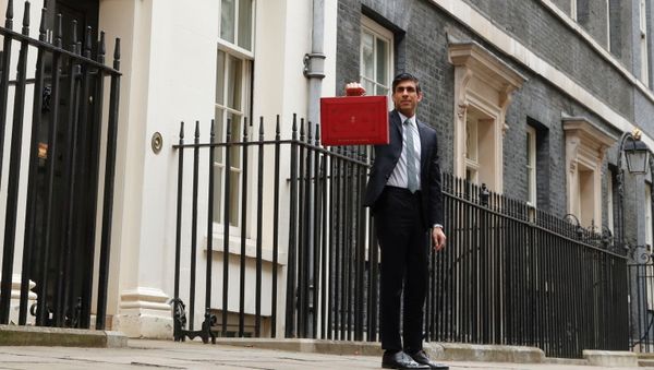 Britain's Chancellor of the Exchequer Rishi Sunak holds the budget box outside Downing Street in London, Britain, March 3, 2021 - Sputnik International