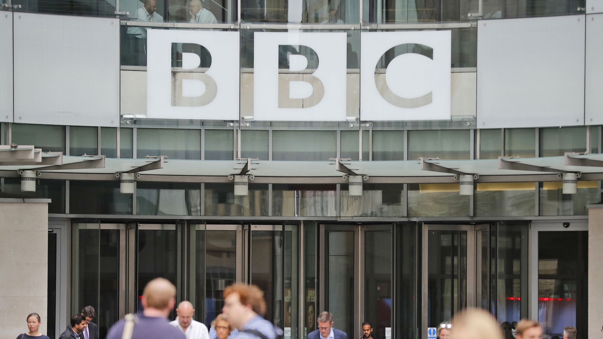 In this file photo dated Wednesday, July 19, 2017, an entrance to the headquarters of the publicly funded BBC in London. Britain’s government announced Wednesday Feb. 5, 2020, that it is considering a change in the way the nation's public broadcaster, the BBC is funded In this file photo dated Wednesday, July 19, 2017, an entrance to the headquarters of the publicly funded BBC in London. Britain’s government announced Wednesday Feb. 5, 2020, that it is considering a change in the way the nation's public broadcaster, the BBC is funded - Sputnik International, 1920, 20.06.2021