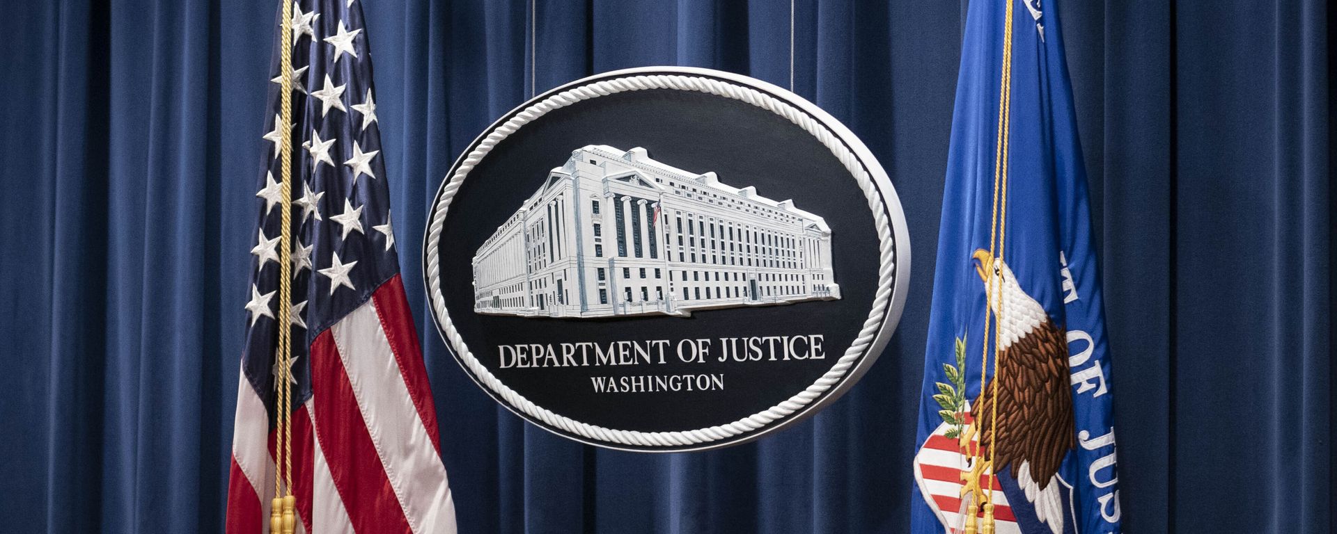 A sign for the Department of Justice is seen ahead of a news conference Tuesday, Jan. 12, 2021, in Washington.  - Sputnik International, 1920, 04.11.2021