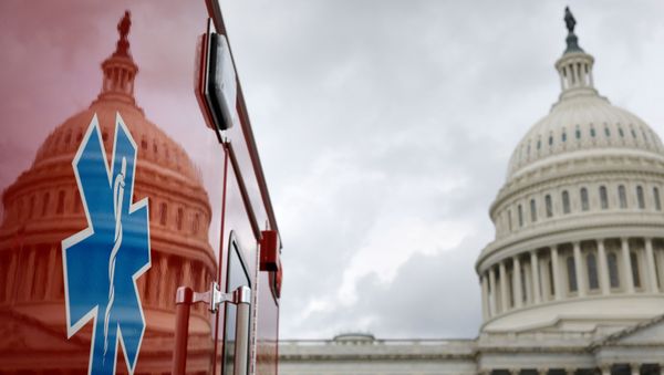 The U.S. Capitol Building is reflected against an ambulance along the East Front on Capitol Hill in Washington, U.S., July 16, 2020 The U.S. Capitol Building is reflected against an ambulance along the East Front on Capitol Hill in Washington, U.S., July 16, 2020 - Sputnik International