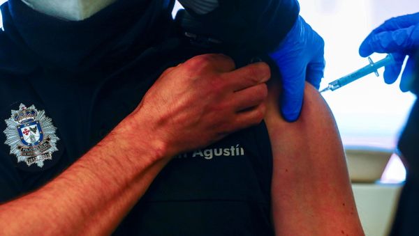 A police officer receives his first dose of the AstraZeneca COVID-19 vaccine, as the coronavirus disease (COVID-19) outbreak continues, at Atletico Madrid's Wanda Metropolitano stadium in Madrid, Spain, February 25, 2021 - Sputnik International