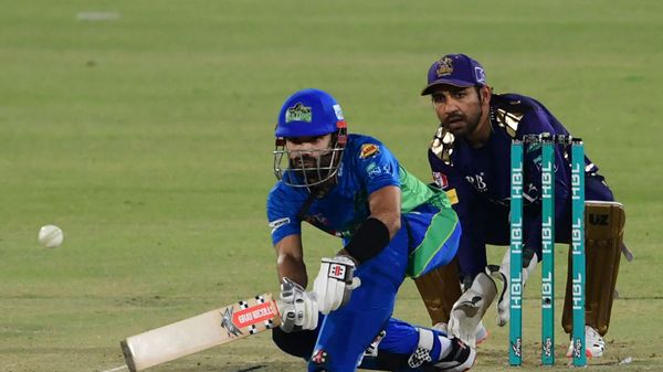 Multan Sultans' Mohammad Rizwan (L) plays a shot during the Pakistan Super League (PSL) T20 cricket match between Quetta Gladiators and Multan Sultans at the National Stadium in Karachi on March 3, 2021 - Sputnik International