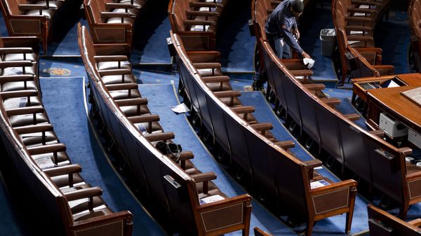 A Capitol worker cleans the House floor on opening day of the 117th Congress at the U.S. Capitol in Washington, Sunday, Jan. 3, 2021 - Sputnik International