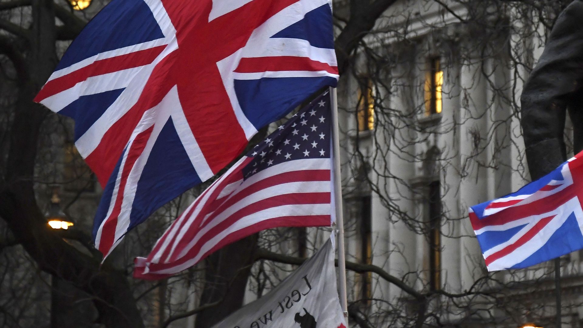 In this file photo dated Friday, Jan. 31, 2020, Brexit supporters hold British and US flags during a rally in London. In this file photo dated Friday, Jan. 31, 2020, Brexit supporters hold British and US flags during a rally in London. - Sputnik International, 1920, 04.03.2021