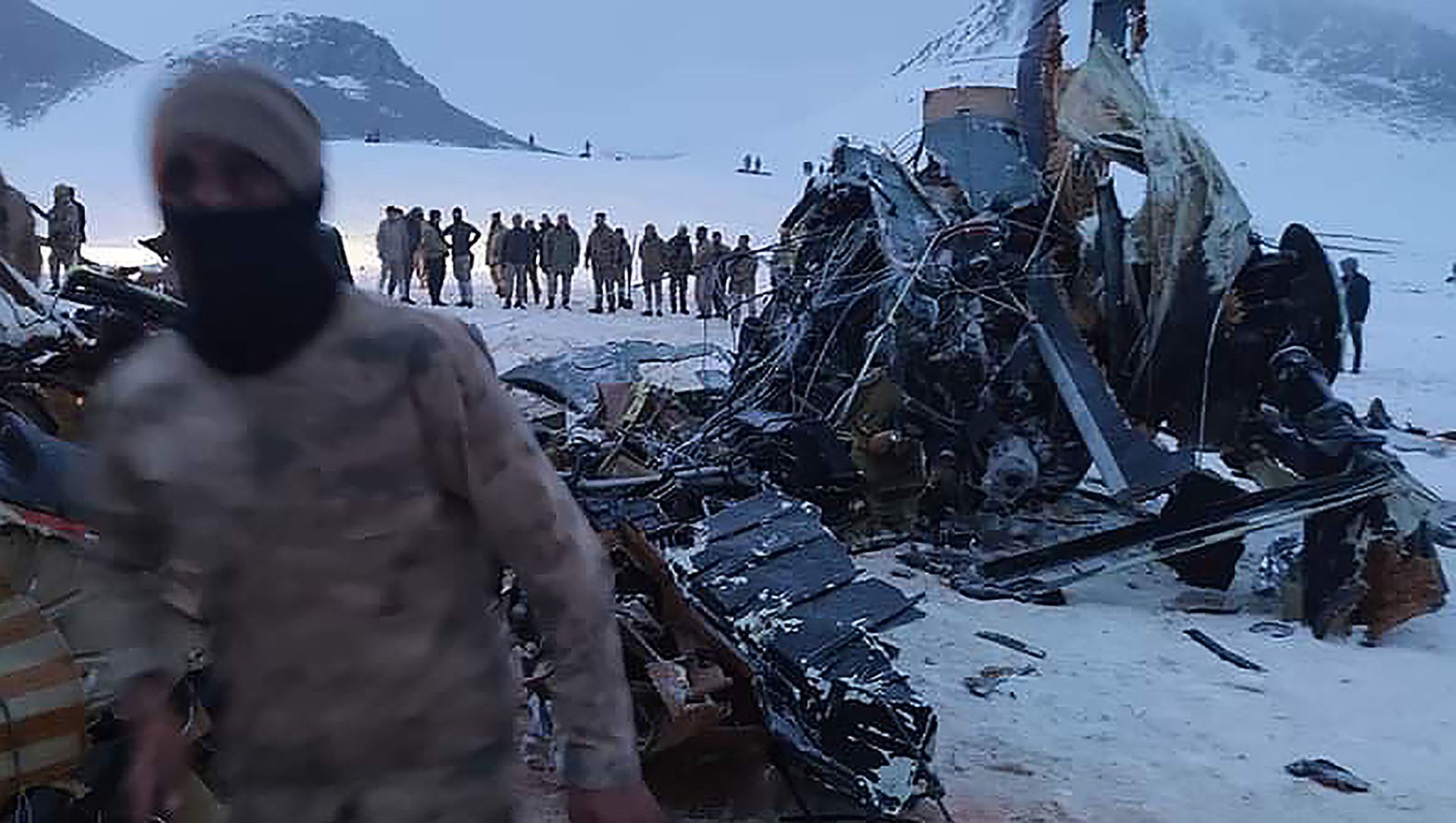 Soldiers and rescue workers stand around the wreckage after an army helicopter crashed in Bitlis, eastern Turkey, Thursday March 4, 2021 Soldiers and rescue workers stand around the wreckage after an army helicopter crashed in Bitlis, eastern Turkey, Thursday March 4, 2021 - Sputnik International, 1920, 05.03.2021
