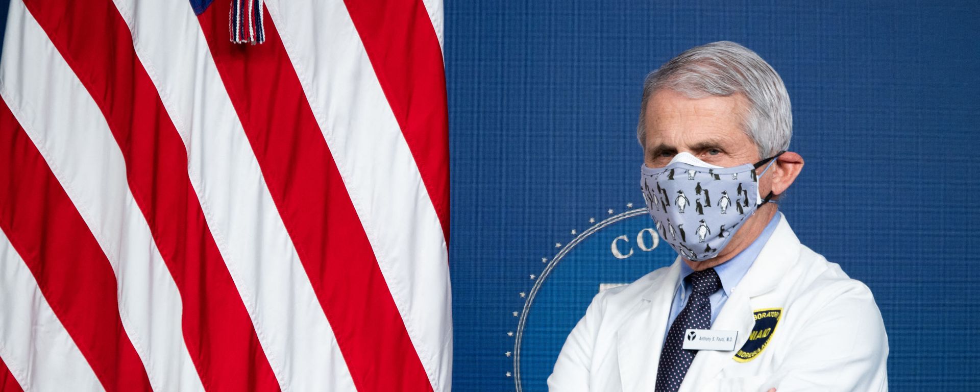 White House Chief Medical Adviser on Covid-19 Dr. Anthony Fauci listens as US President Joe Biden (out of frame) speaks about the 50 million doses of the Covid-19 vaccine shot administered in the US during an event commemorating the milestone in the Eisenhower Executive Office Building in Washington, DC, February 25, 2021. - Sputnik International, 1920, 18.07.2022