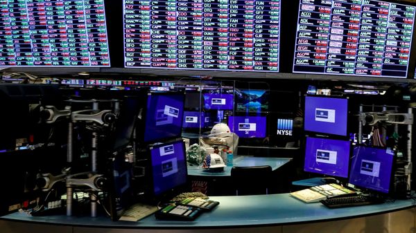 Dividers are seen inside a trading post on the trading floor as preparations are made for the return to trading at the New York Stock Exchange (NYSE) in New York, U.S., May 22, 2020. - Sputnik International