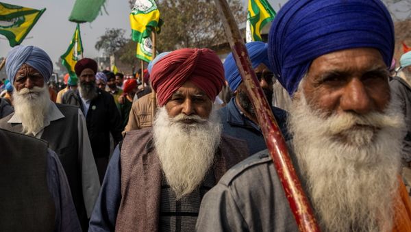 Farmers and agricultural workers arrive to attend a rally against farm laws, in Barnala, northern state of Punjab, India, February 21, 2021.  - Sputnik International