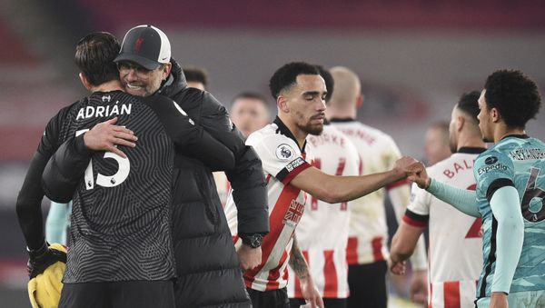 Liverpool's manager Jurgen Klopp hugs Liverpool's goalkeeper Adrian, left, after the English Premier League soccer match between Sheffield United and Liverpool at Bramall Lane stadium in Sheffield, England, Sunday, Feb. 28, 2021. - Sputnik International