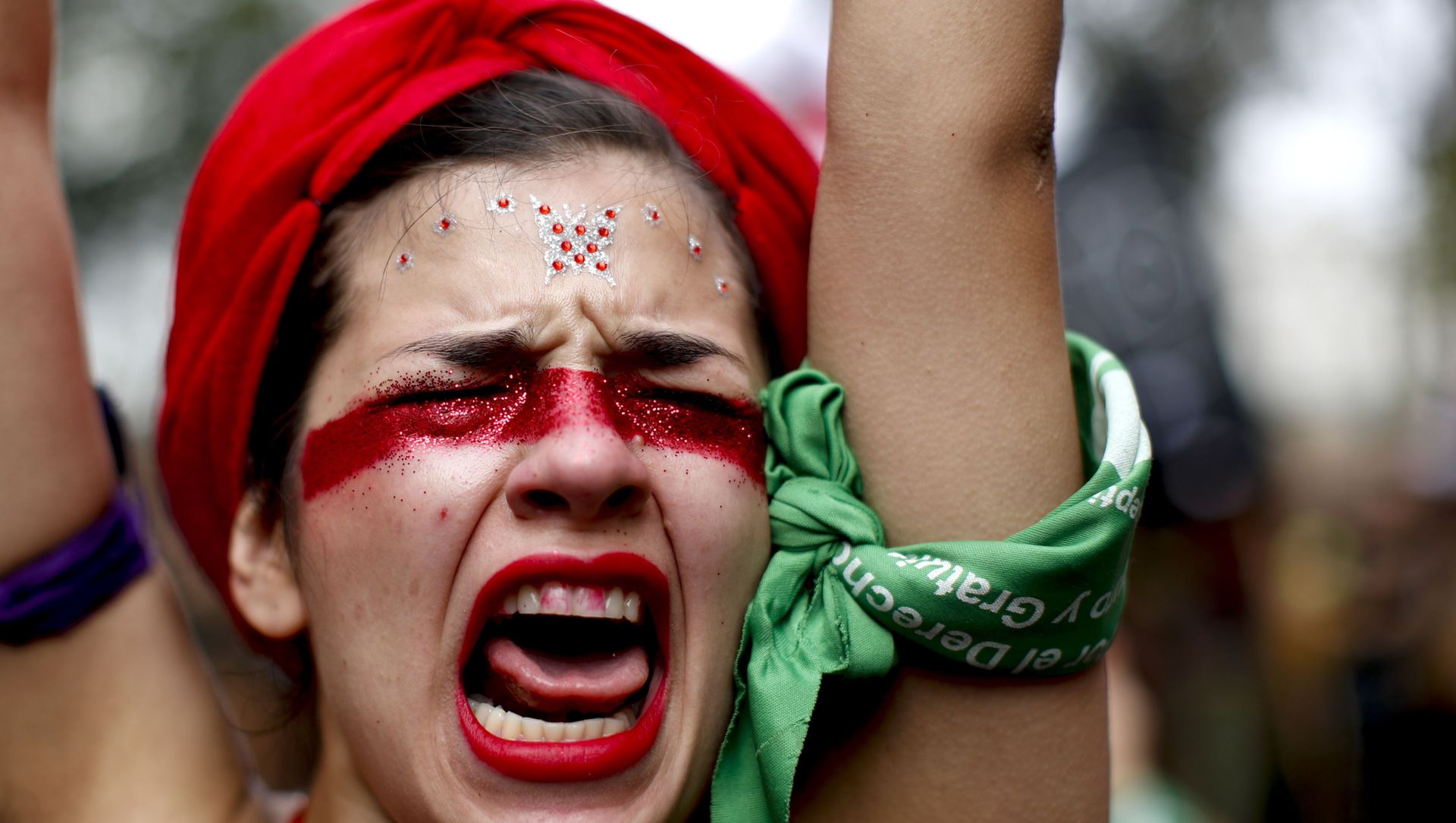 A woman shouts slogans as she marches to Congress to commemorate International Women's Day in Buenos Aires, Argentina, Monday, March 9, 2020. A woman shouts slogans as she marches to Congress to commemorate International Women's Day in Buenos Aires, Argentina, Monday, March 9, 2020. - Sputnik International, 1920, 08.03.2021