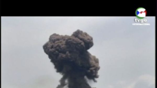 This TVGE image made from video shows smoke rising over the blast site at a military barracks in Bata, Equatorial Guinea, Sunday, March 7, 2021. A series of explosions killed at least 20 people and wounded more than 600 others on Sund - Sputnik International
