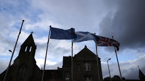 European, Scottish and Great Britain flags float in front of the Scottish Parliament in Edinburgh, Scotland, Wednesday, Sept 4, 2019. The Scottish court says British Prime Minister Boris Johnson's planned suspension of Parliament is lawful. The closely watched decision was revealed Wednesday. It is the first of several challenges to Johnson's maneuver that gives lawmakers little time to prevent Britain from crashing out of the European Union without an agreement on Oct. 31.  - Sputnik International