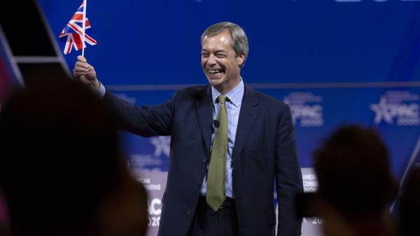 Leader of the Brexit Party and former Member of the European Parliament (MEP) Nigel Farage waves a British flag as he speaks during Conservative Political Action Conference, CPAC 2020, at the National Harbor, in Oxon Hill, Md., Friday, Feb. 28, 2020. - Sputnik International