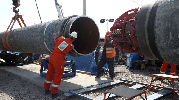 FILE PHOTO: FILE PHOTO: Workers are seen at the construction site of the Nord Stream 2 gas pipeline, near the town of Kingisepp, Leningrad region, Russia, June 5, 2019 - Sputnik International