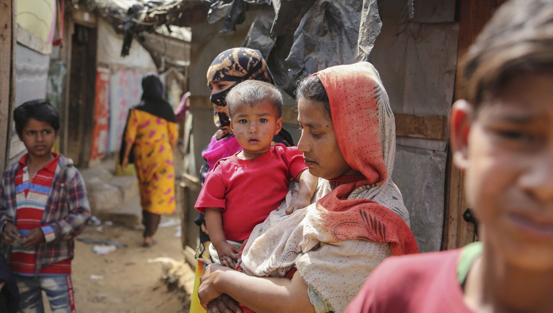 Rohingyas refugees stand at a makeshift camp on the outskirts of Jammu, India, Sunday, March 7, 2021 Rohingyas refugees stand at a makeshift camp on the outskirts of Jammu, India, Sunday, March 7, 2021 - Sputnik International, 1920, 05.04.2021