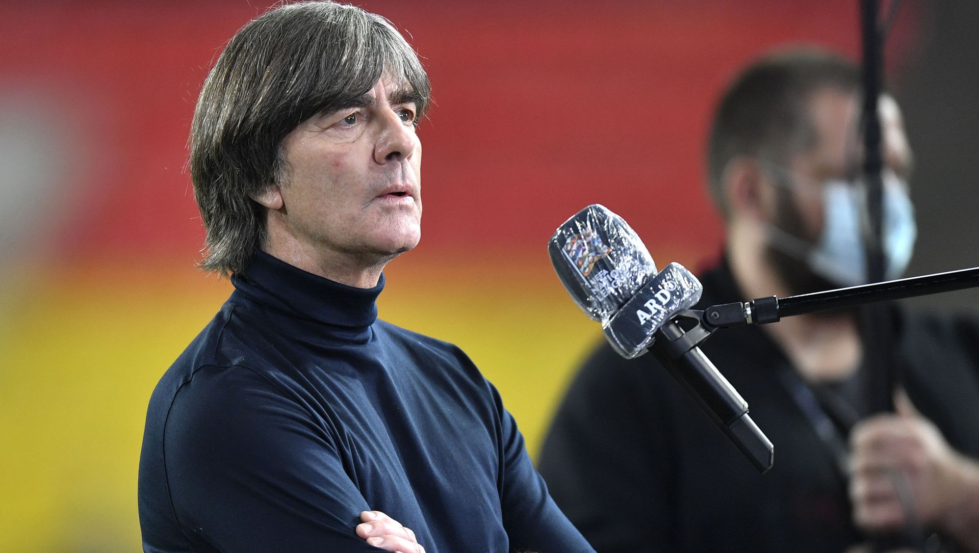 FILE - In this Tuesday, Oct. 13, 2020 file photo, Germany's head coach Joachim Loew is interviewed ahead of the UEFA Nations League soccer match between Germany and Switzerland in Cologne, Germany. Loew on Tuesday, Nov. FILE - In this Tuesday, Oct. 13, 2020 file photo, Germany's head coach Joachim Loew is interviewed ahead of the UEFA Nations League soccer match between Germany and Switzerland in Cologne, Germany. Loew on Tuesday, Nov. - Sputnik International, 1920, 09.03.2021