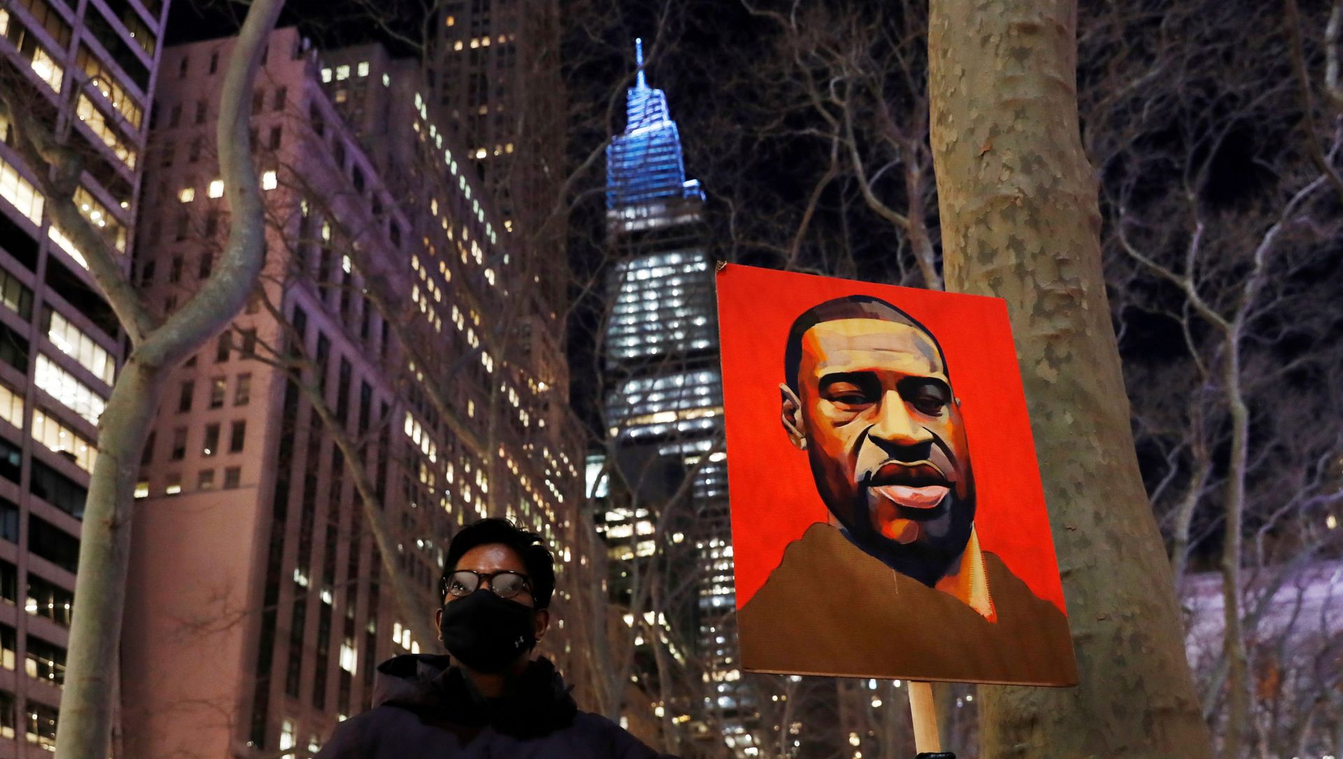 A demonstrator holds up an image of George Floyd during a rally on the first day of the trial of former Minneapolis police officer Derek Chauvin, on murder charges in the death of Floyd, in New York City, New York, U.S., March 8, 2021. A demonstrator holds up an image of George Floyd during a rally on the first day of the trial of former Minneapolis police officer Derek Chauvin, on murder charges in the death of Floyd, in New York City, New York, U.S., March 8, 2021. - Sputnik International, 1920, 29.03.2021