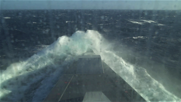 A view of the bow on USS Zumwalt (DDG 1000) during testing in Sea State 6 conditions on Oct. 25, 2020. A cloud of spray engulfed the bow as a result of pitch motion and high winds - Sputnik International