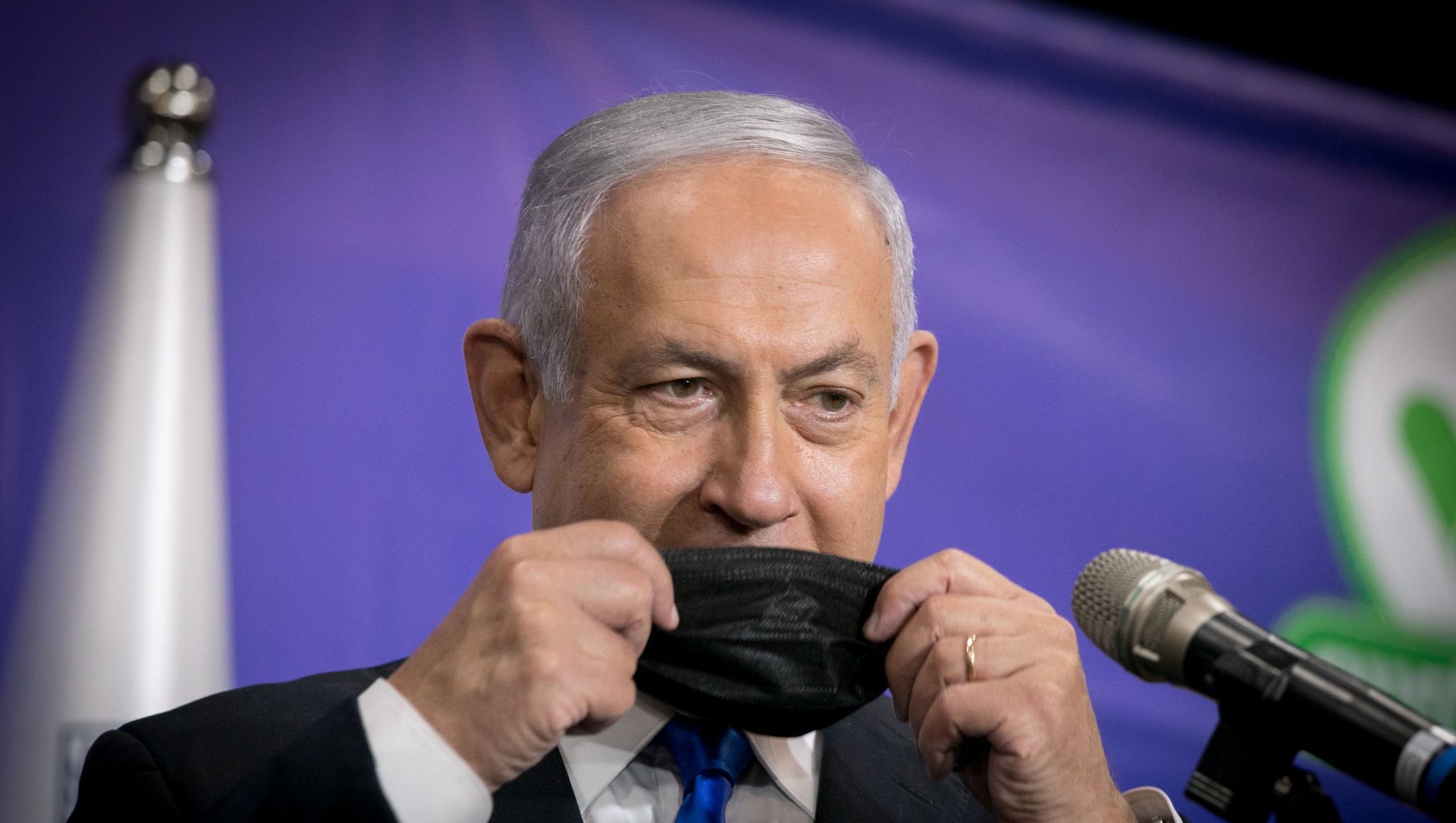 Israeli Prime Minister Benjamin Netanyahu adjusts his mask during a news conference after his meeting with the Israeli citizen no. 5,000,000 to get the Pfizer-BioNTech coronavirus disease (COVID-19) vaccine, in Tel Aviv, Israel, March 8, 2021 Israeli Prime Minister Benjamin Netanyahu adjusts his mask during a news conference after his meeting with the Israeli citizen no. 5,000,000 to get the Pfizer-BioNTech coronavirus disease (COVID-19) vaccine, in Tel Aviv, Israel, March 8, 2021 - Sputnik International, 1920, 19.03.2021