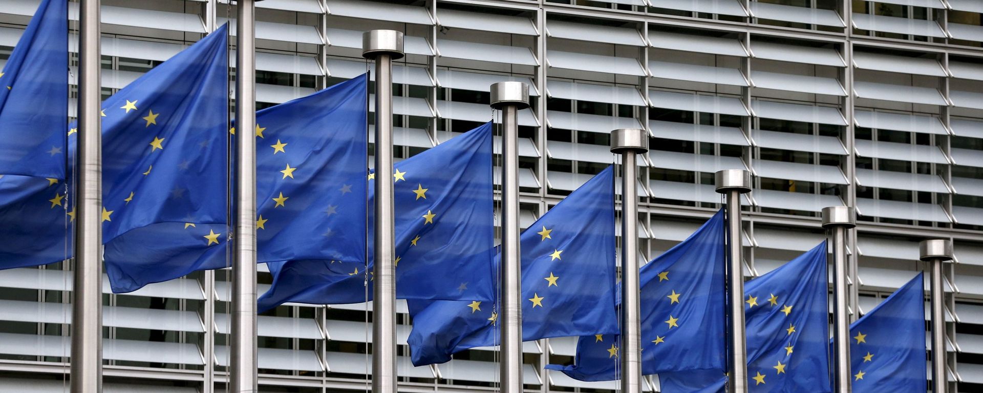 FILE PHOTO: Picture shows European Union flags fluttering outside the EU Commission headquarters in Brussels - Sputnik International, 1920, 17.03.2021