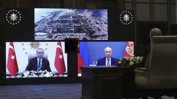 Turkey's Recep Tayyip Erdogan sitting extreme right, and on screen bottom left, with Russia's President Vladimir Putin, bottom right, speak during a ceremony as they have remotely inaugurated the construction of a third nuclear reactor of Akkuyu power plant in Mersin province on the Mediterranean coast, in Ankara, Turkey, Wednesday, March 10, 2021. Erdogan called the plant a symbol of Turkish-Russian cooperation. - Sputnik International