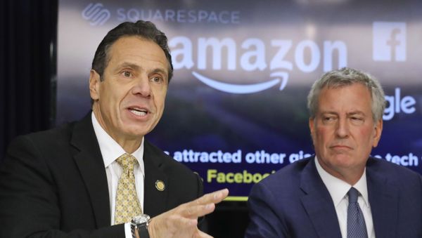 New York Gov. Andrew Cuomo, left, and New York City Mayor Bill de Blasio hold a news conference Tuesday Nov. 13, 2018, in New York. Amazon said it will split its much-anticipated second headquarters between New York and northern Virginia. Its New York location will be in the Long Island City neighborhood of Queens. (AP Photo/Bebeto Matthews) - Sputnik International