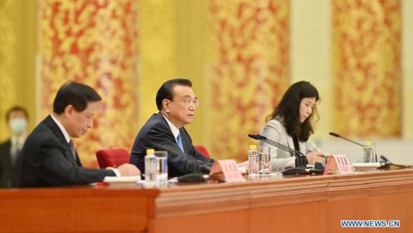 Chinese Premier Li Keqiang meets the press after the closing of the fourth session of the 13th National People's Congress at the Great Hall of the People in Beijing, capital of China, March 11, 2021. Li took questions from Chinese and foreign reporters via video link - Sputnik International