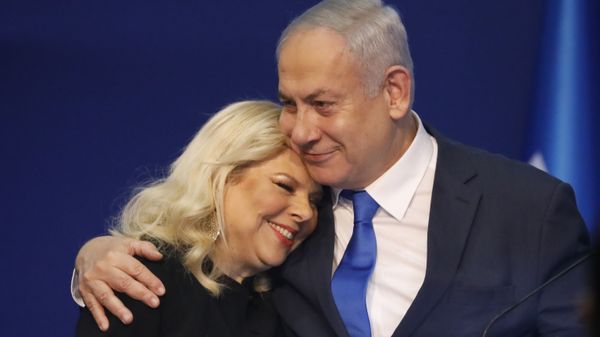 Israeli Prime Minister Benjamin Netanyahu hugs his wife Sara after first exit poll results for the Israeli elections at his party's headquarters in Tel Aviv, Israel, Monday, March. 2, 2020 - Sputnik International