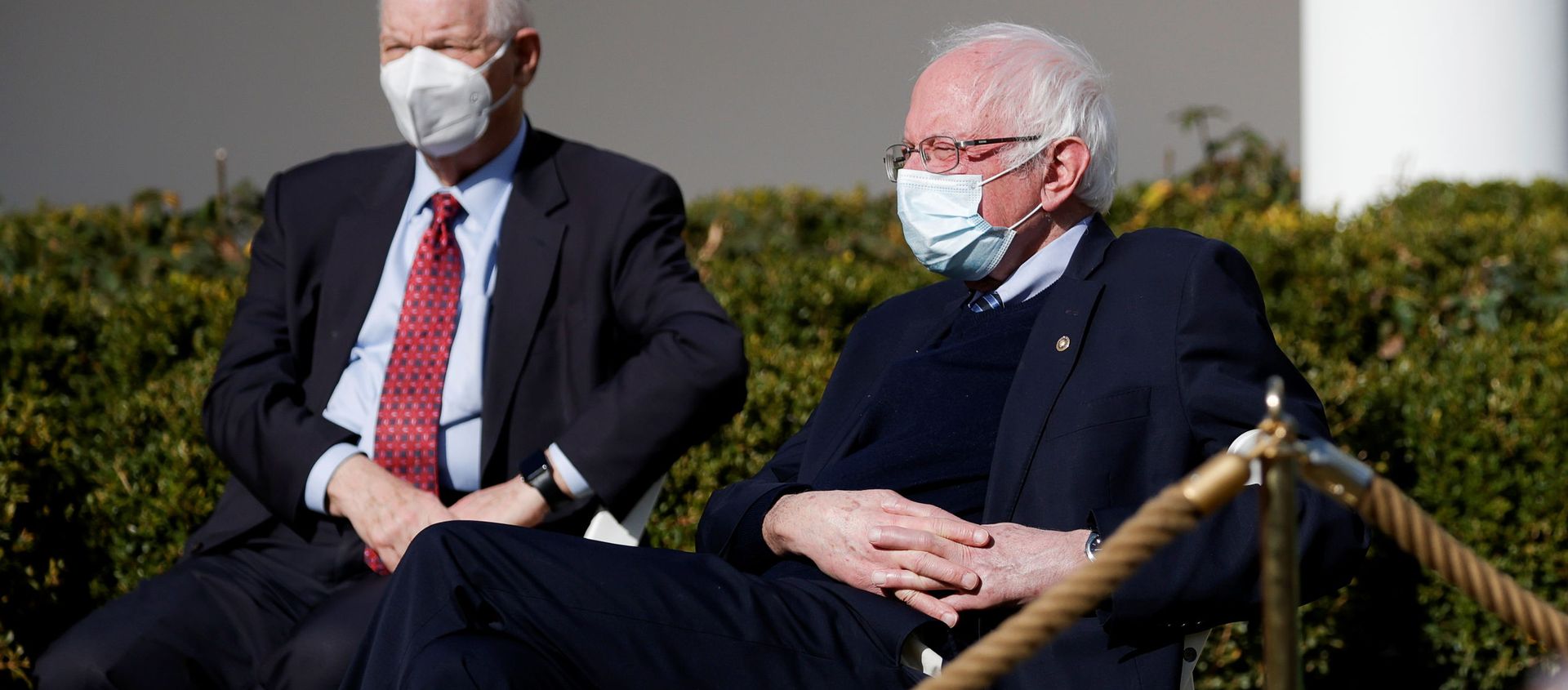 U.S. Senator Bernie Sanders (I-VT) listens with other guests as President Joe Biden speaks about the $1.9 trillion American Rescue Plan Act during an event to celebrate the legislation in the Rose Garden at the White House in Washington, U.S., March 12, 2021. U.S. Senator Bernie Sanders (I-VT) listens with other guests as President Joe Biden speaks about the $1.9 trillion American Rescue Plan Act during an event to celebrate the legislation in the Rose Garden at the White House in Washington, U.S., March 12, 2021. - Sputnik International, 1920, 15.05.2021
