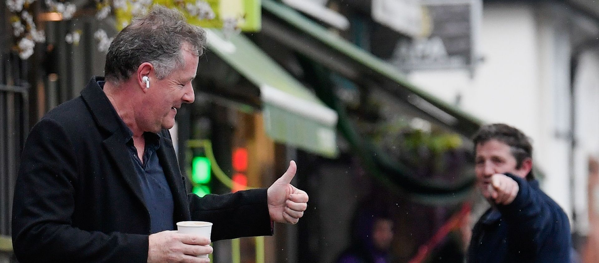 Journalist and television presenter Piers Morgan gestures back to a passerby as he walks near his house, after he left his high-profile breakfast slot with the broadcaster ITV, following his long-running criticism of Prince Harry's wife Meghan, in London, Britain, March 10, 2021 Journalist and television presenter Piers Morgan gestures back to a passerby as he walks near his house, after he left his high-profile breakfast slot with the broadcaster ITV, following his long-running criticism of Prince Harry's wife Meghan, in London, Britain, March 10, 2021 - Sputnik International, 1920, 13.03.2021