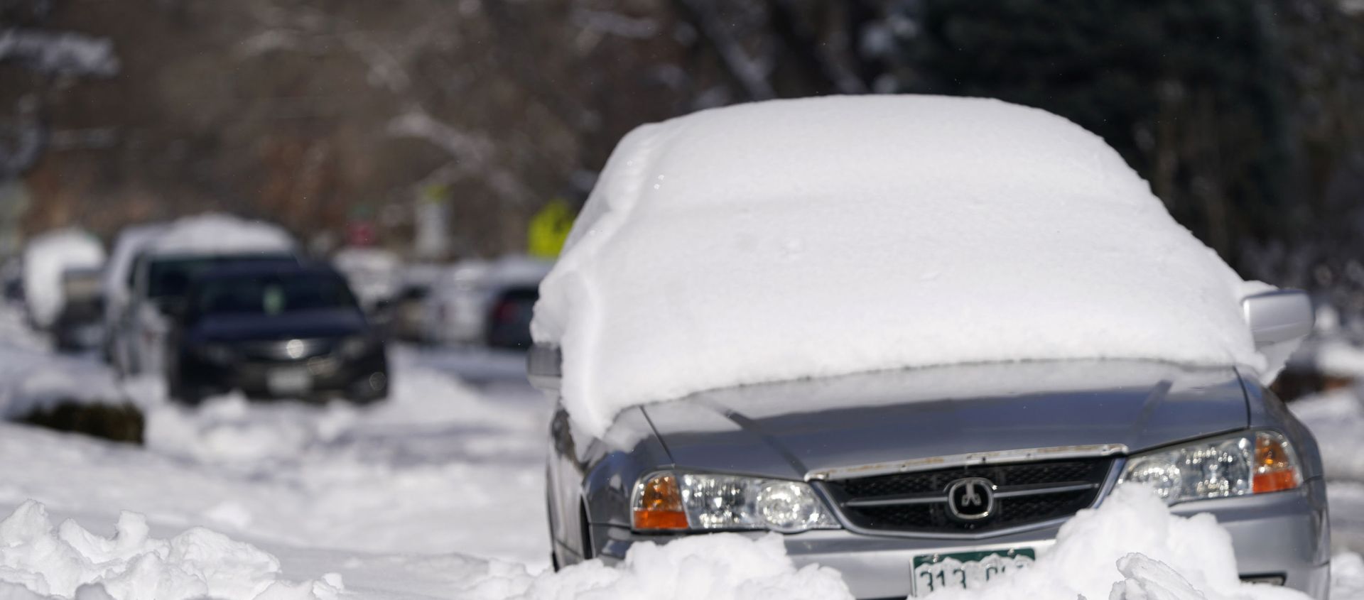 A sedan is buried after more than a foot of snow left by a late winter storm that swept over the region Thursday, Feb. 25, 2021, in Denver. A sedan is buried after more than a foot of snow left by a late winter storm that swept over the region Thursday, Feb. 25, 2021, in Denver. - Sputnik International, 1920, 13.03.2021