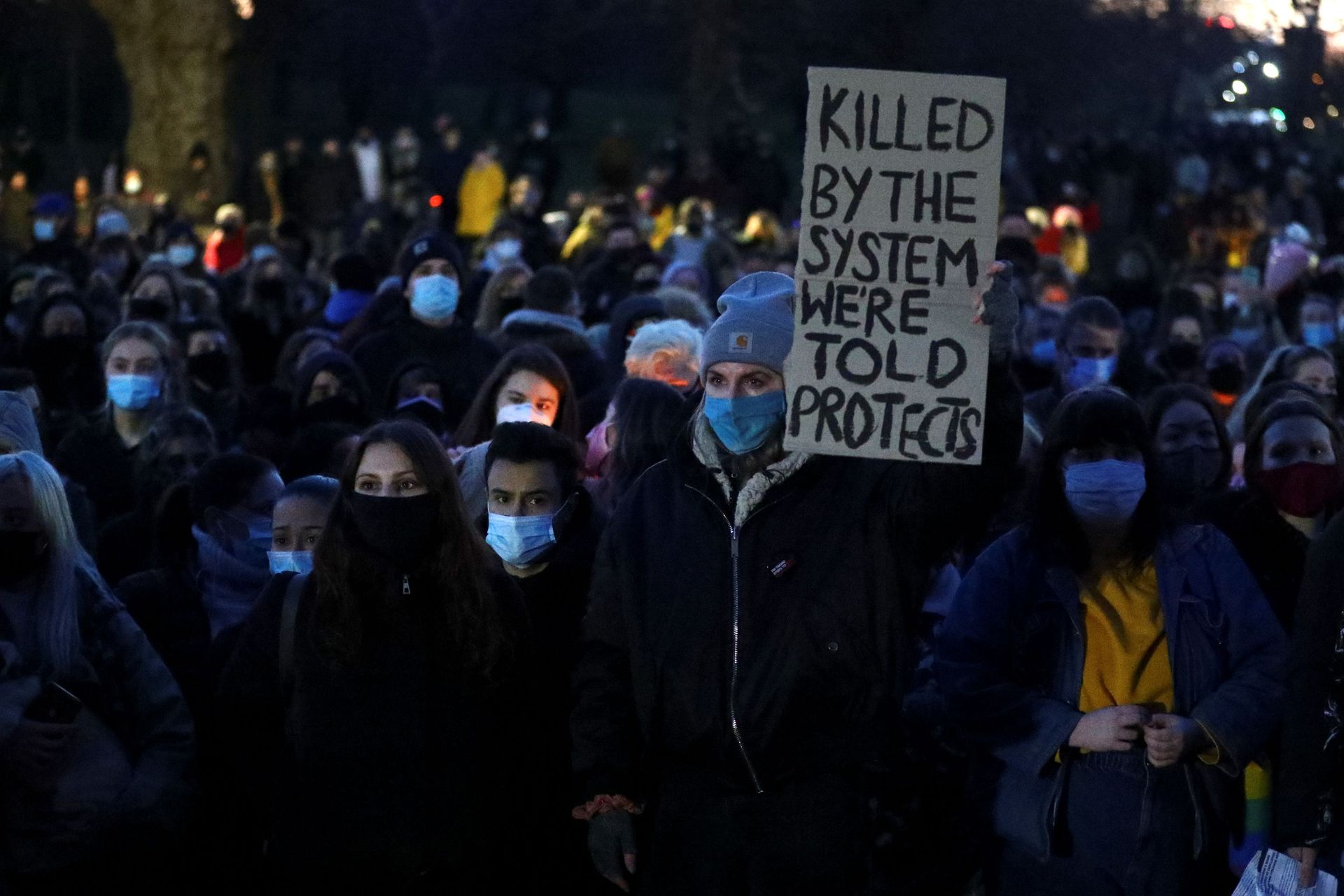 People gather at a memorial site in Clapham Common Bandstand, following the kidnap and murder of Sarah Everard, in London, Britain March 13, 2021. REUTERS/Hannah McKay - Sputnik International, 1920, 11.10.2021