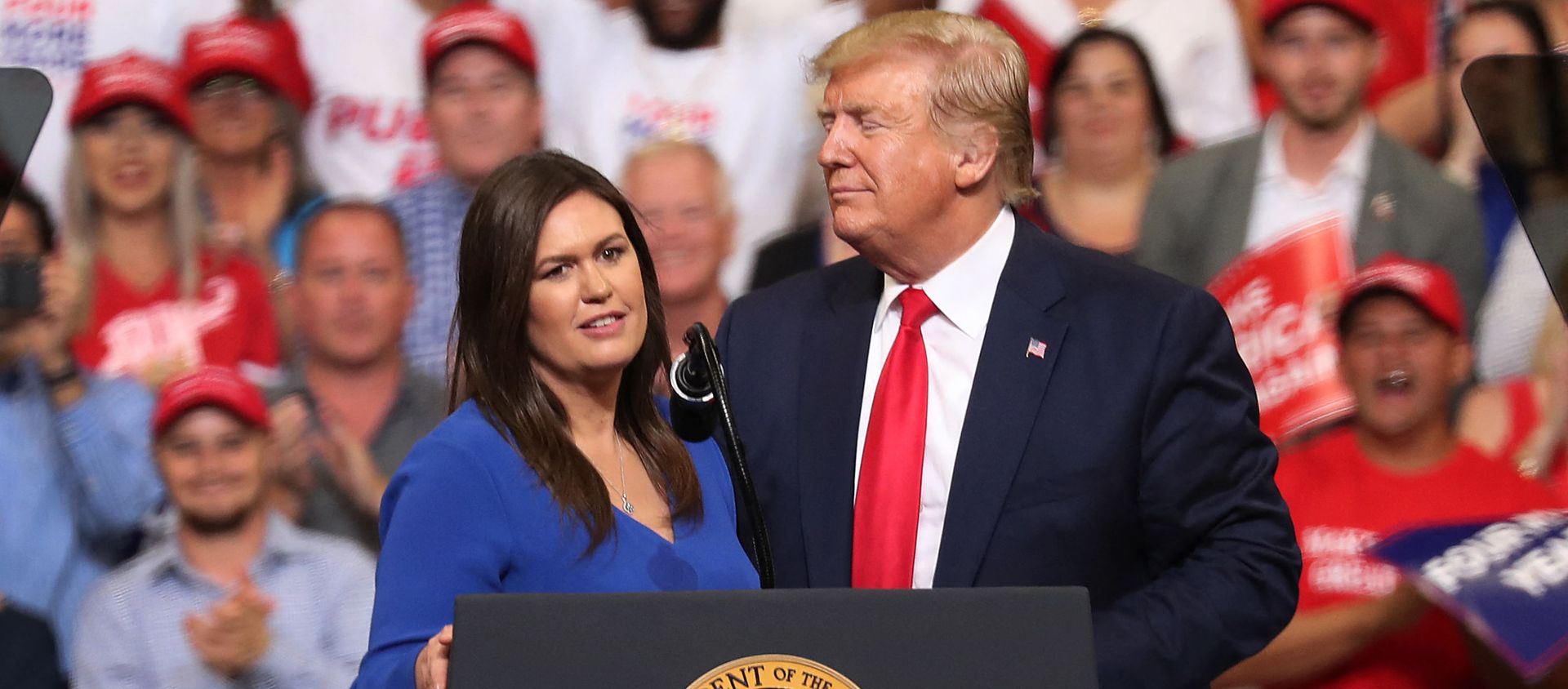 JUNE 18: U.S. President Donald Trump stands with Sarah Huckabee Sanders, who announced that she is stepping down as the White House press secretary, during his rally where he announced his candidacy for a second presidential term at the Amway Center on June 18, 2019 in Orlando, Florida JUNE 18: U.S. President Donald Trump stands with Sarah Huckabee Sanders, who announced that she is stepping down as the White House press secretary, during his rally where he announced his candidacy for a second presidential term at the Amway Center on June 18, 2019 in Orlando, Florida - Sputnik International, 1920, 15.03.2021