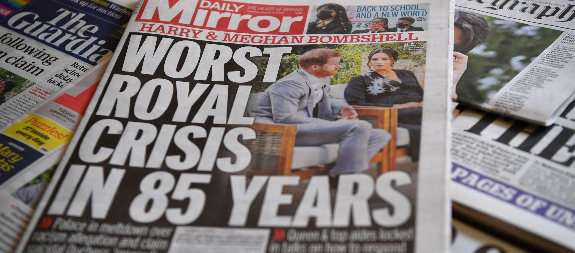 An arrangement of UK daily newspapers photographed as an illustration in Brenchley, Kent on March 9, 2021, shows front page headlines reporting on the story of the interview given by Meghan, Duchess of Sussex, wife of Britain's Prince Harry, Duke of Sussex, to Oprah Winfrey, which aired on UK broadcaster ITV. - Sputnik International, 1920, 16.03.2021