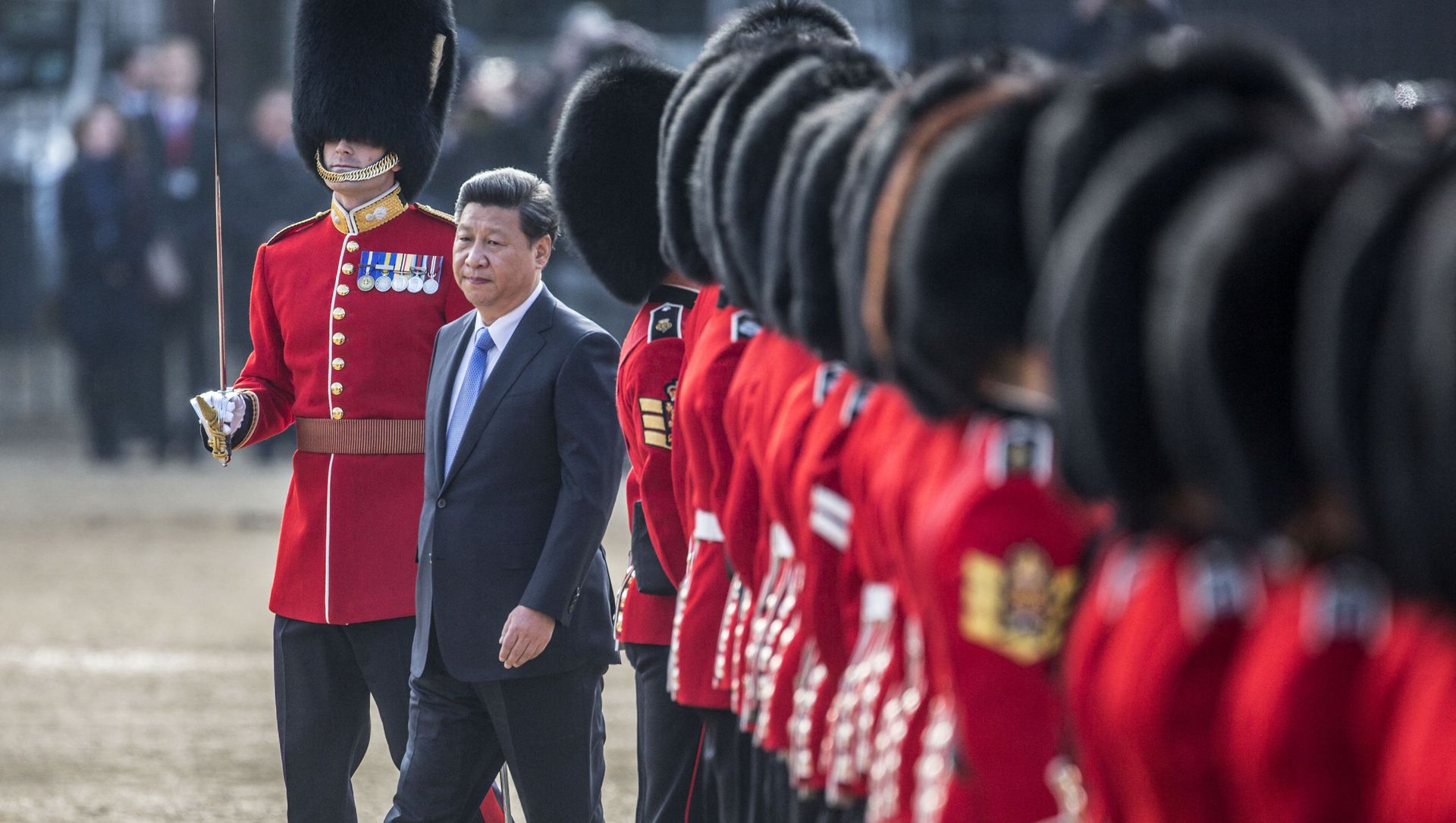Chinese President Xi Jinping (C) inspects the guard of honour on Horse Guards Parade in central London on October 20, 2015 during the ceremonial welcome for Chinese President Xi Jinping and his wife Peng Liyuan on the first official day of a state visit. Chinese President Xi Jinping (C) inspects the guard of honour on Horse Guards Parade in central London on October 20, 2015 during the ceremonial welcome for Chinese President Xi Jinping and his wife Peng Liyuan on the first official day of a state visit. - Sputnik International, 1920, 16.03.2021