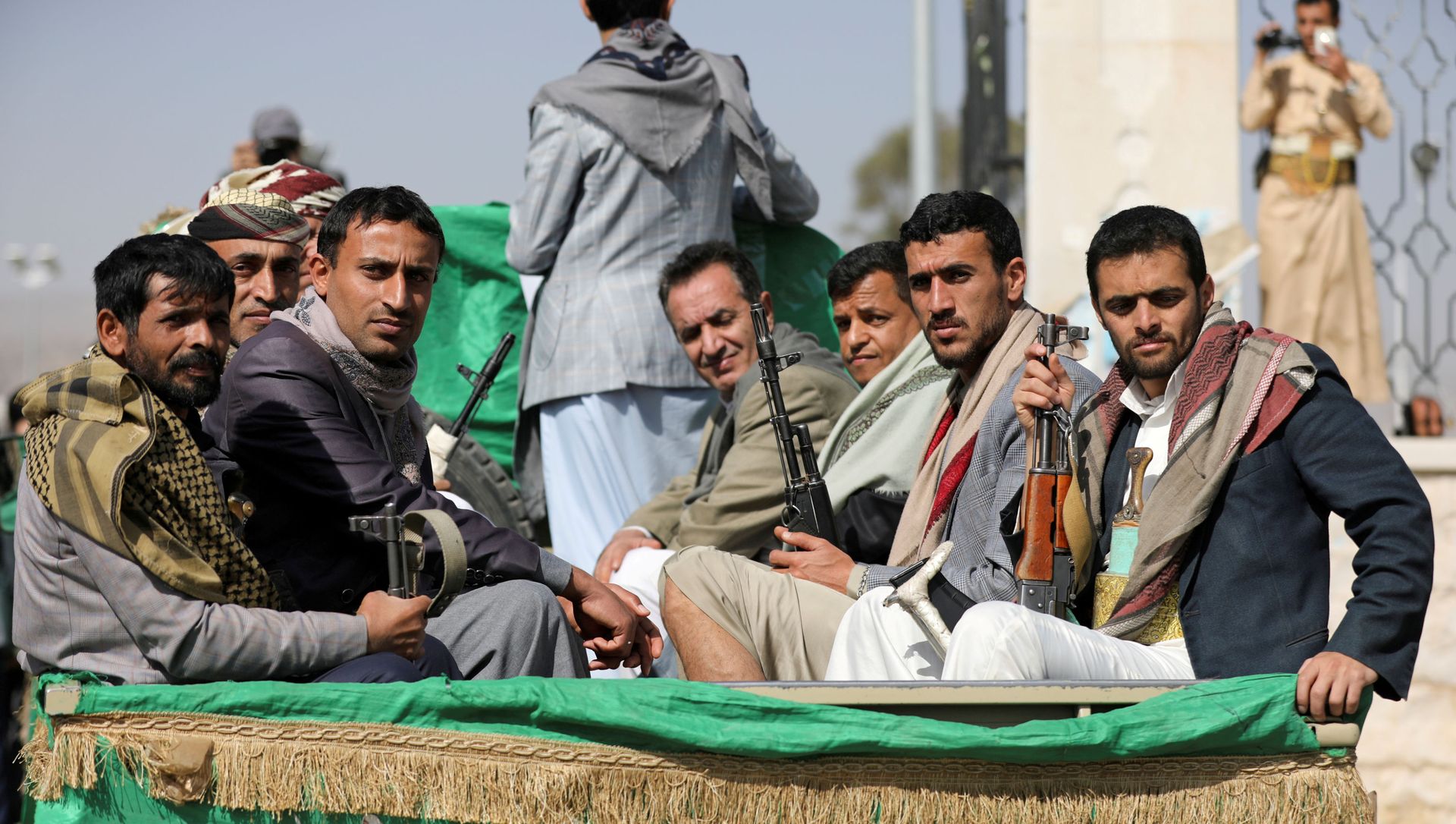 Armed Houthi followers ride on the back of a truck after participating in a funeral of Houthi fighters killed in recent fighting against government forces in Yemen's oil-rich province of Marib, in Sanaa, Yemen February 20, 2021. Armed Houthi followers ride on the back of a truck after participating in a funeral of Houthi fighters killed in recent fighting against government forces in Yemen's oil-rich province of Marib, in Sanaa, Yemen February 20, 2021. - Sputnik International, 1920, 16.03.2021