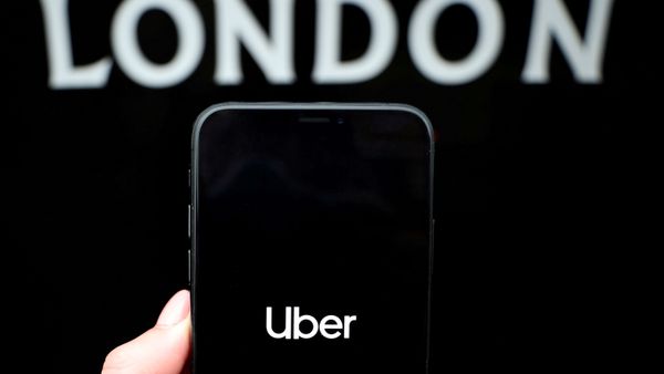 The Uber logo is displayed on a mobile phone in this picture illustration taken November 25, 2019.  - Sputnik International