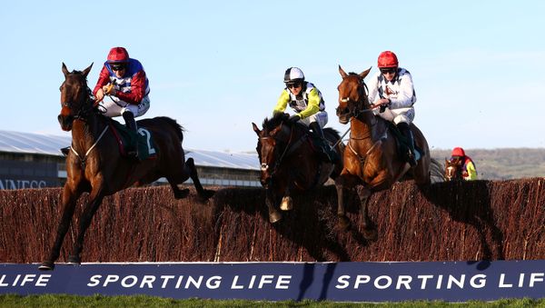 Horse Racing - Cheltenham Festival - Cheltenham Racecourse, Cheltenham, Britain - March 16, 2021  Jack Kennedy riding Galvin (R) wins the 4.50 Sam Vestey National Hunt Challenge Cup Novices' Chase    - Sputnik International