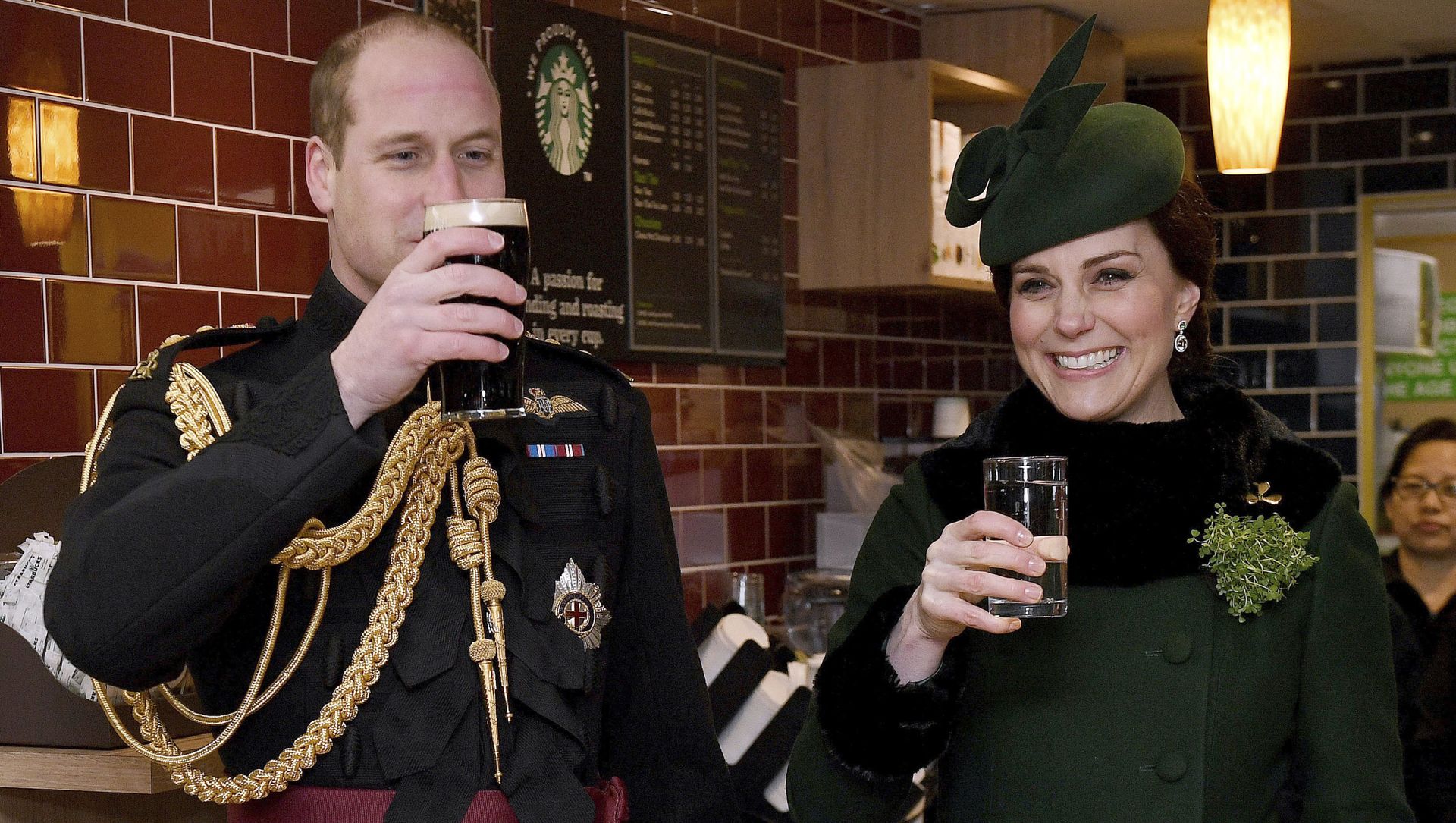 Britain's Kate, the Duchess of Cambridge, smiles as she and Prince William toast, as they visit the 1st Battalion Irish Guards, for the St. Patrick's Day Parade, at Cavalry Barracks, in Hounslow, England, Saturday, March 17, 2018. Britain's Kate, the Duchess of Cambridge, smiles as she and Prince William toast, as they visit the 1st Battalion Irish Guards, for the St. Patrick's Day Parade, at Cavalry Barracks, in Hounslow, England, Saturday, March 17, 2018. - Sputnik International, 1920, 28.03.2021