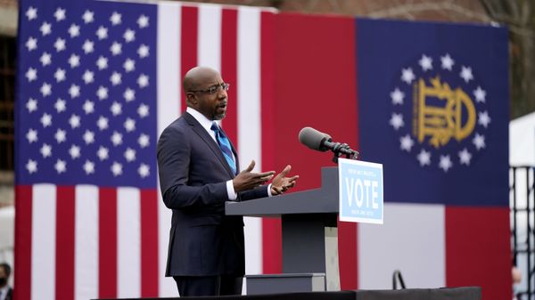 Georgia Democratic candidate for U.S. Senate Raphael Warnock speaks during a drive-in rally Tuesday, Dec. 15, 2020, in Atlanta - Sputnik International