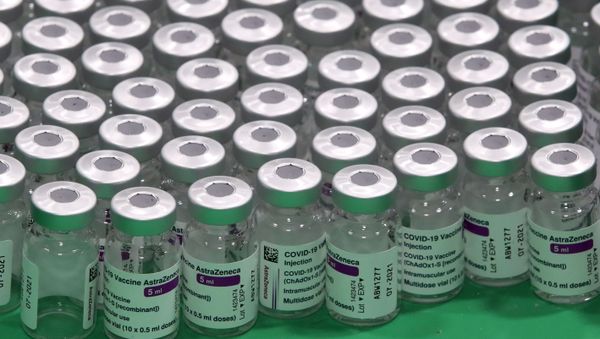 Empty vials of Oxford/AstraZeneca's COVID-19 vaccine are seen at a vaccination centre in Antwerp, Belgium March 18, 2021. REUTERS/Yves Herman Empty vials of Oxford/AstraZeneca's COVID-19 vaccine are seen at a vaccination centre in Antwerp, Belgium March 18, 2021. REUTERS/Yves Herman - Sputnik International