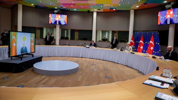 European Commission President Ursula von der Leyen and EU Council President Charles Michel hold a video call with Turkey's President Recep Tayyip Erdogan, in Brussels, Belgium, March 19, 2021. - Sputnik International