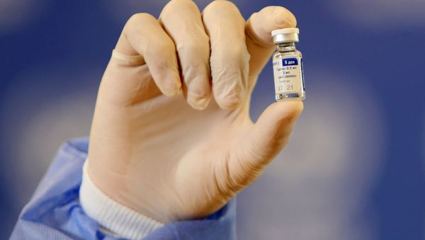 A Palestinian health worker displays a vial of Russia's Sputnik V vaccine in Gaza City February 24, 2021. - Sputnik International