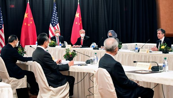 U.S. Secretary of State Antony Blinken (R) speaks while facing Yang Jiechi (L), director of the Central Foreign Affairs Commission Office, and Wang Yi (2nd L), China's State Councilor Wang and Foreign Minister, at the opening session of US-China talks at the Captain Cook Hotel in Anchorage, Alaska on March 18, 2021. U.S. Secretary of State Antony Blinken (R) speaks while facing Yang Jiechi (L), director of the Central Foreign Affairs Commission Office, and Wang Yi (2nd L), China's State Councilor Wang and Foreign Minister, at the opening session of US-China talks at the Captain Cook Hotel in Anchorage, Alaska on March 18, 2021. - Sputnik International