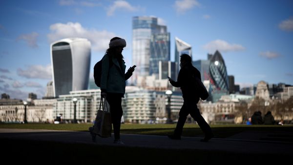 The City of London financial district can be seen as people walk along the south side of the River Thames, amid the coronavirus disease (COVID-19) outbreak in London, Britain, March 19, 2021 - Sputnik International