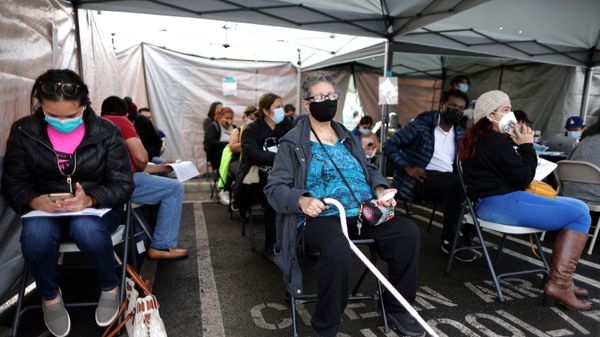 Leticia Robles, 70, sits in the observation area after receiving a coronavirus disease (COVID-19) vaccination, at Jordan Downs in Los Angeles, California, U.S., March 10, 2021. - Sputnik International