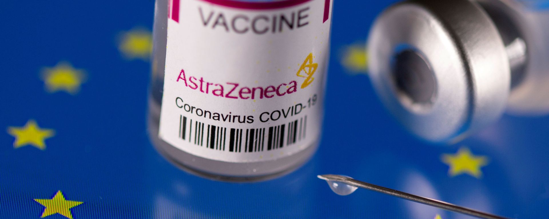 FILE PHOTO: Vials labelled AstraZeneca coronavirus disease (COVID-19) vaccine placed on displayed EU flag are seen in this illustration picture - Sputnik International, 1920, 11.10.2021