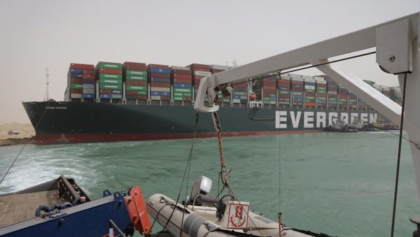 Stranded container ship Ever Given, one of the world's largest container ships, is seen after it ran aground, in Suez Canal, Egypt March 25, 2021 - Sputnik International